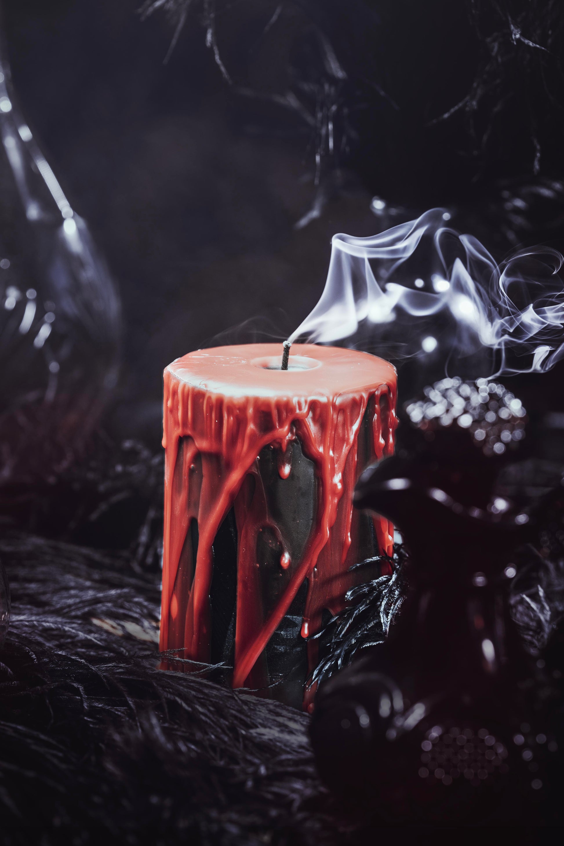 black beeswax candle with red